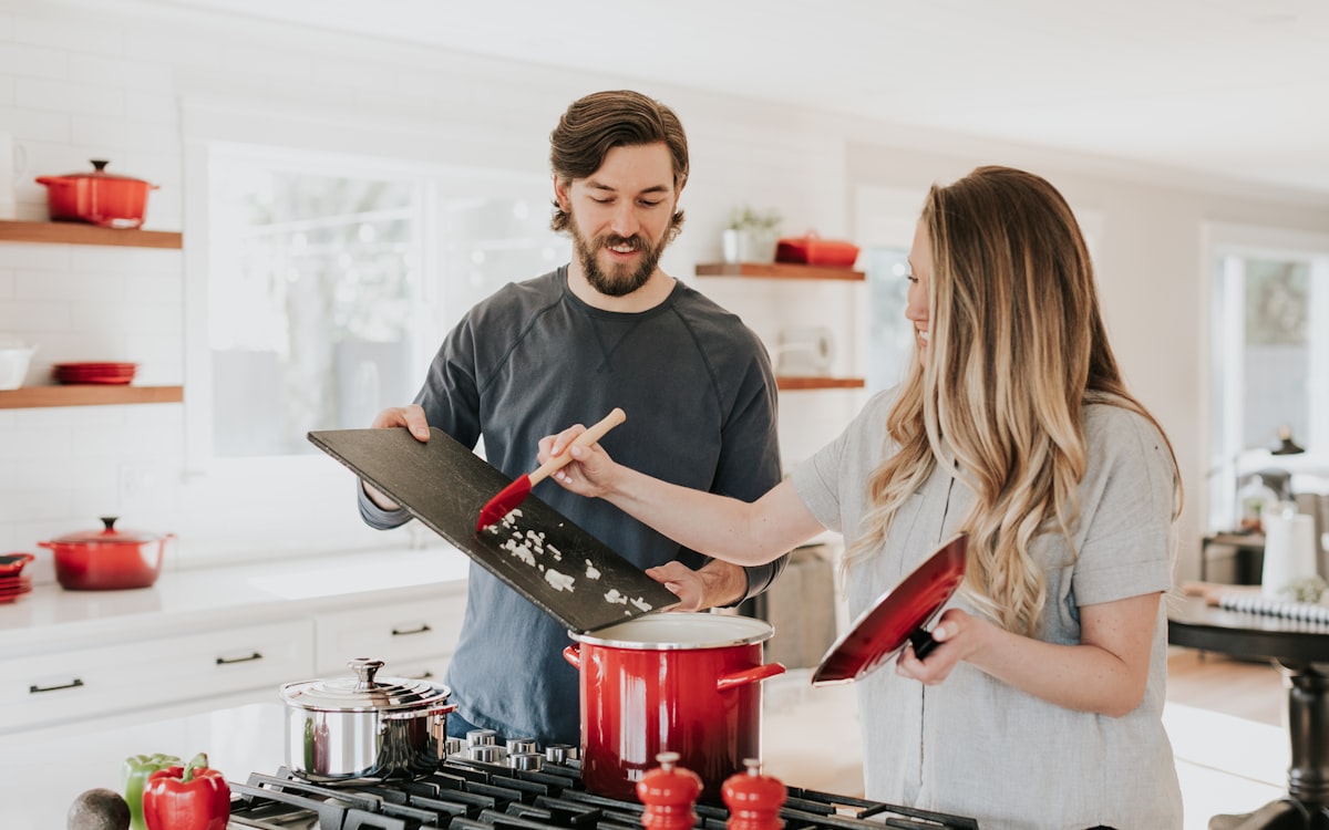 Modern kitchen remodel with white cabinetry and quartz countertops in a Houston home